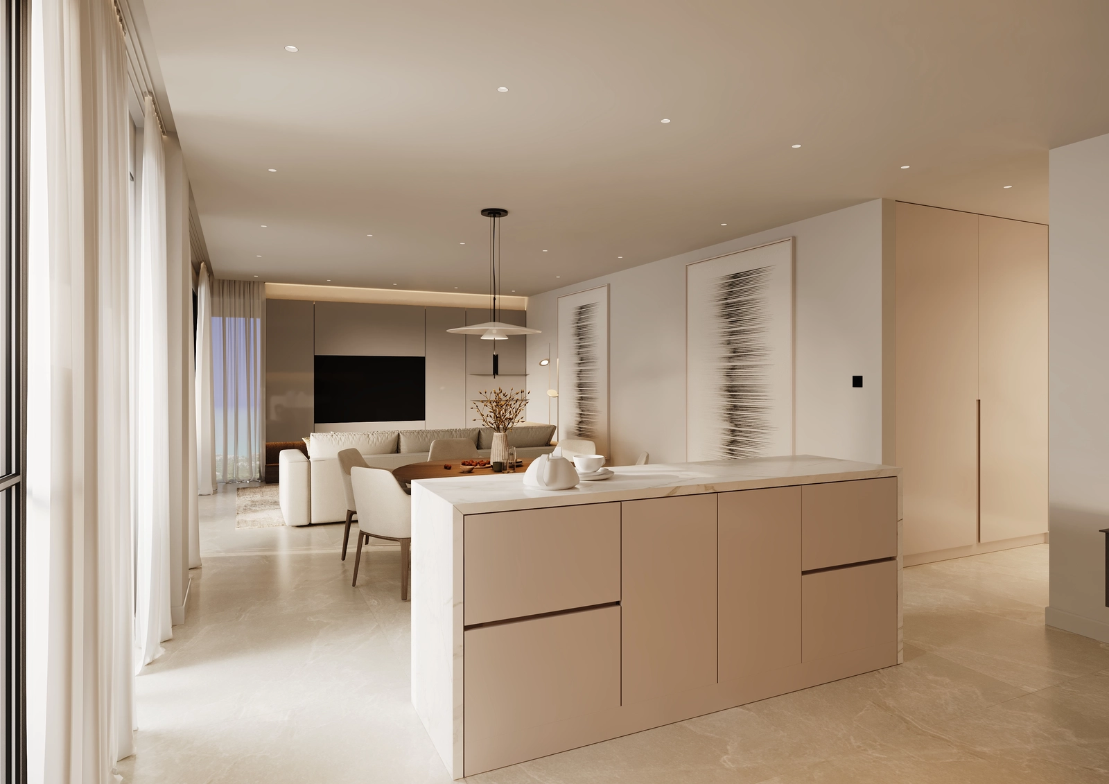 Una cocina moderna se integra perfectamente con las zonas de salón y comedor para un entretenimiento sin esfuerzo.