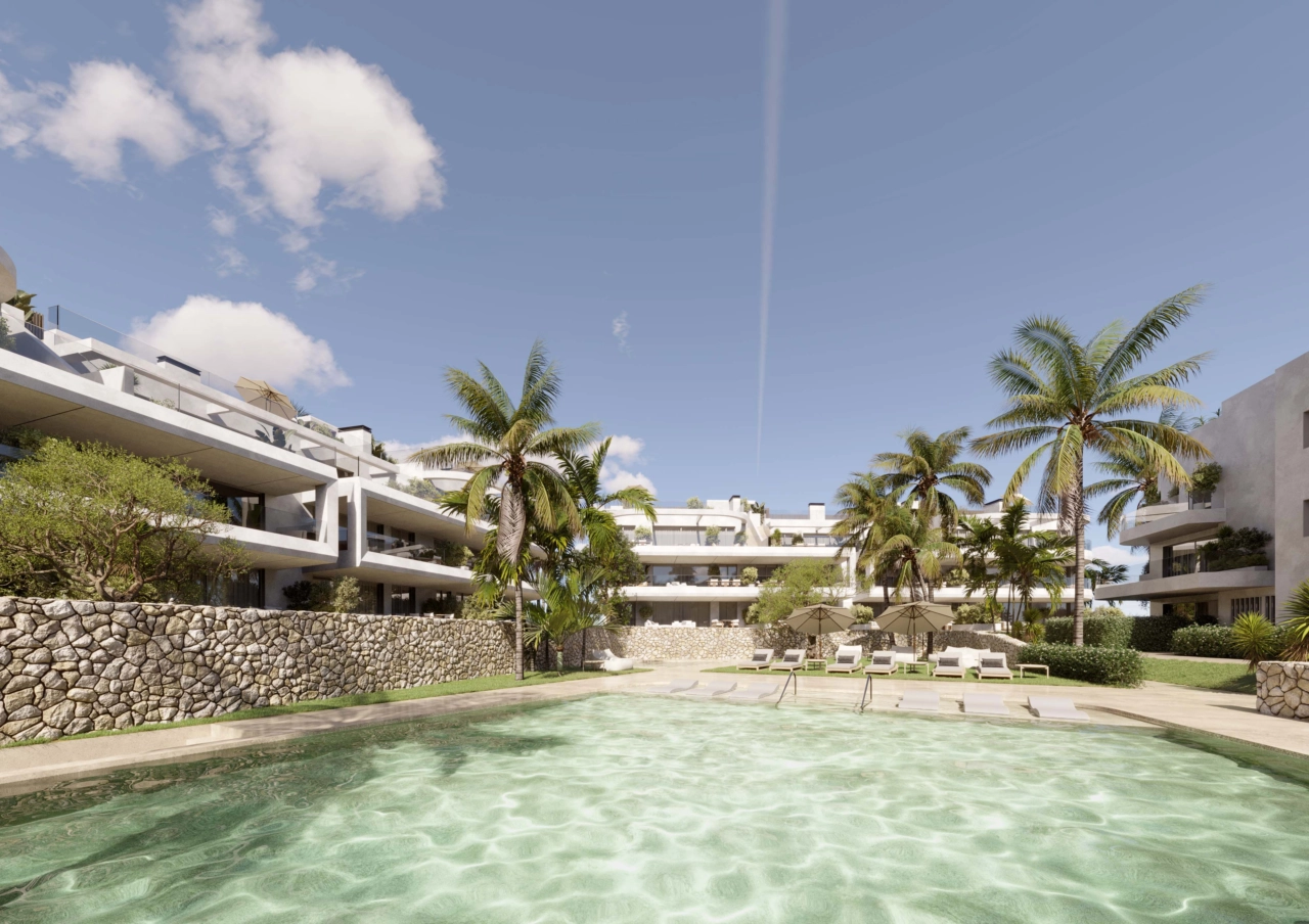 La acogedora piscina comunitaria se encuentra en jardines paisajísticos, creando un oasis privado para el disfrute de los residentes.