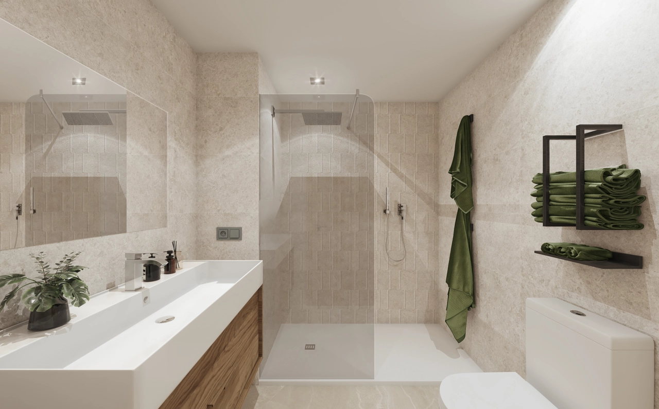 Un cuarto de baño elegantemente equipado con accesorios modernos, materiales de calidad y una estética limpia y elegante.