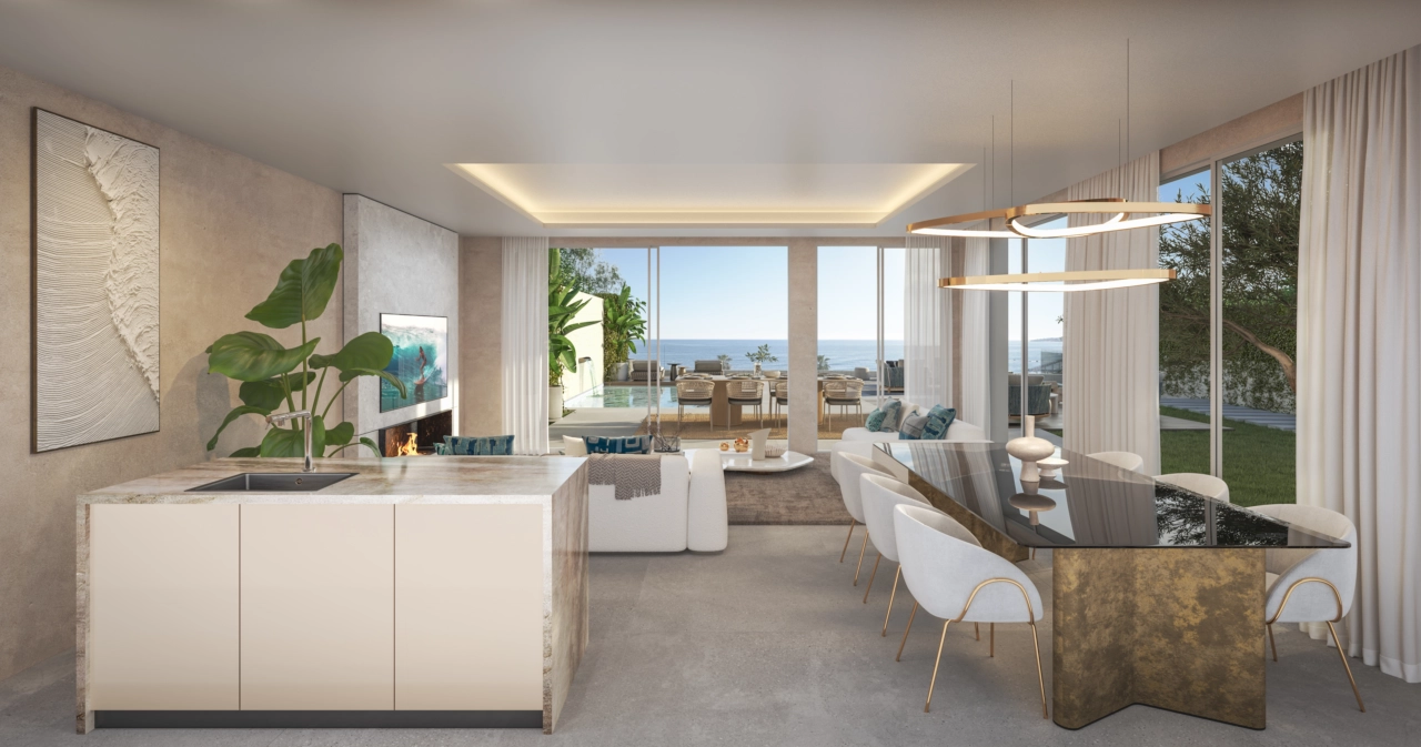 Una zona de estar de concepto abierto que se conecta a la perfección con el exterior y el mar.